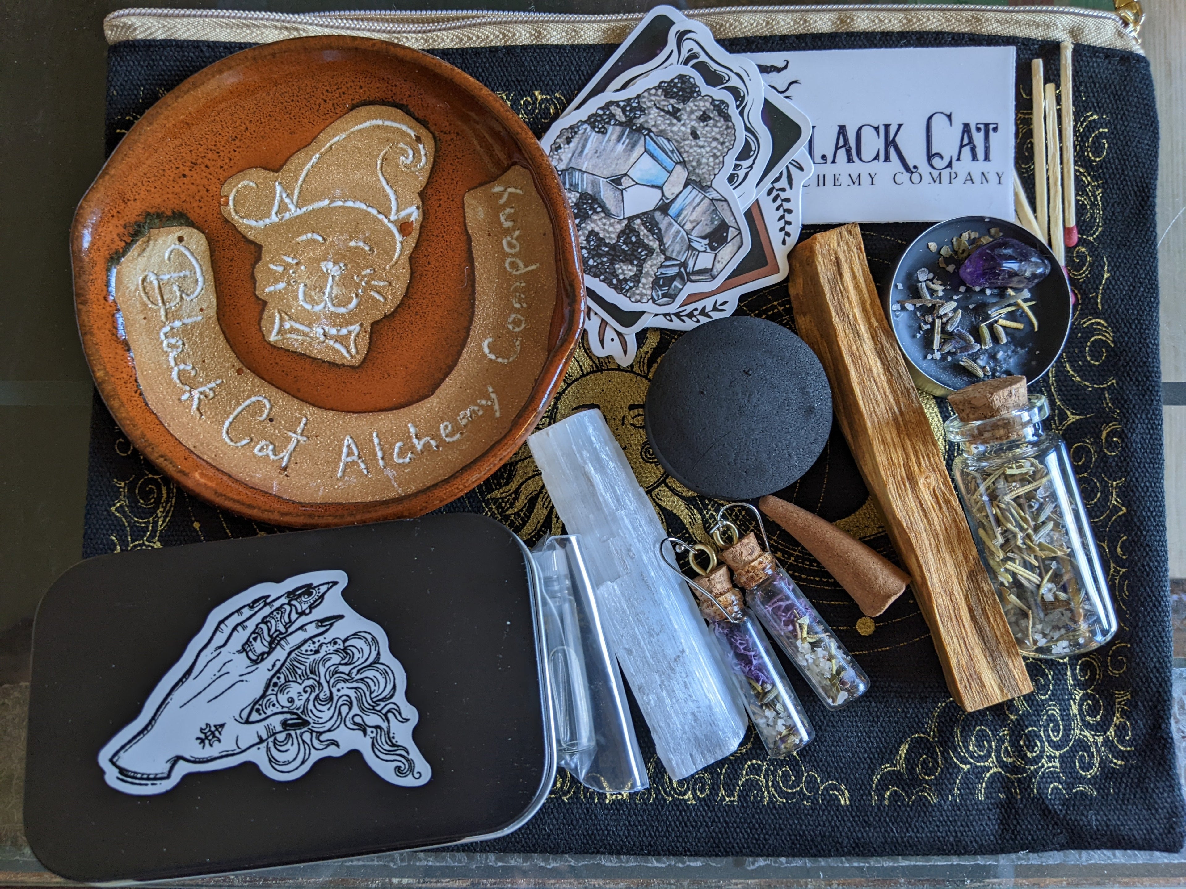 Curated magical bundles featuring handmade jewelry, spell tools, and intentional witchy accessories