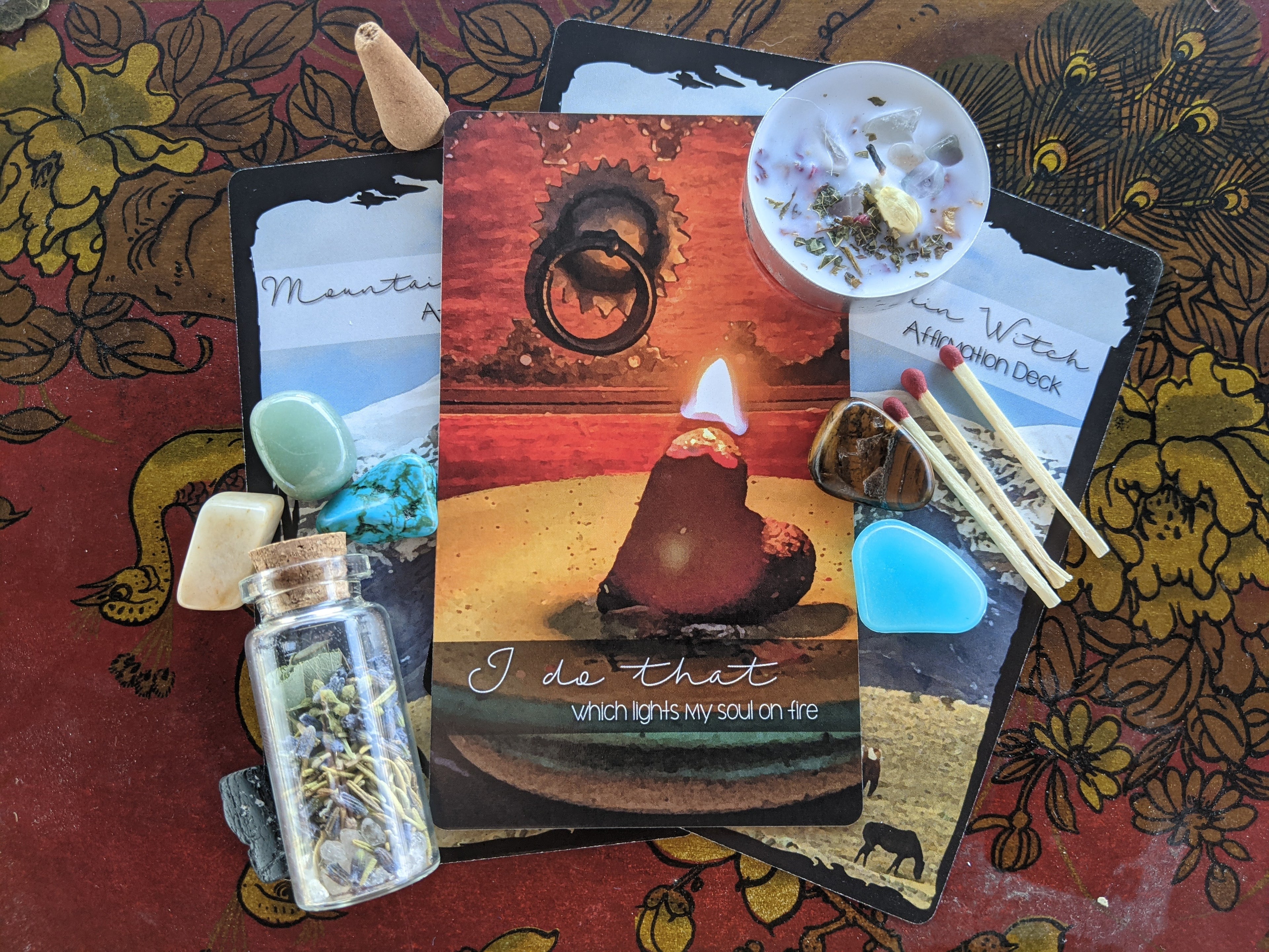 Divination tools and decks including tarot, oracle, and mountain witch affirmation decks