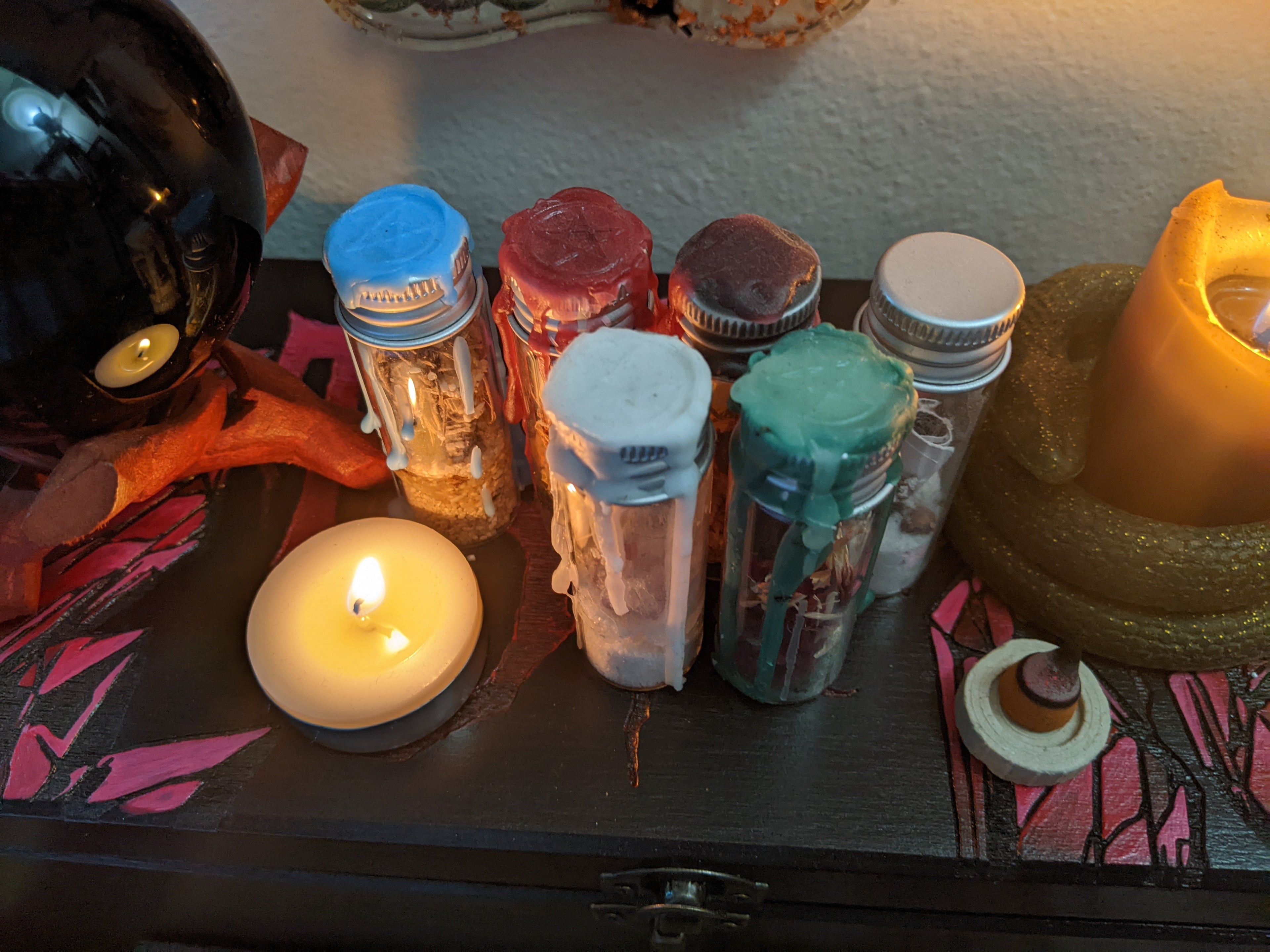 Curated spells collection featuring spell jars, spell boxes, and intentional magical tools