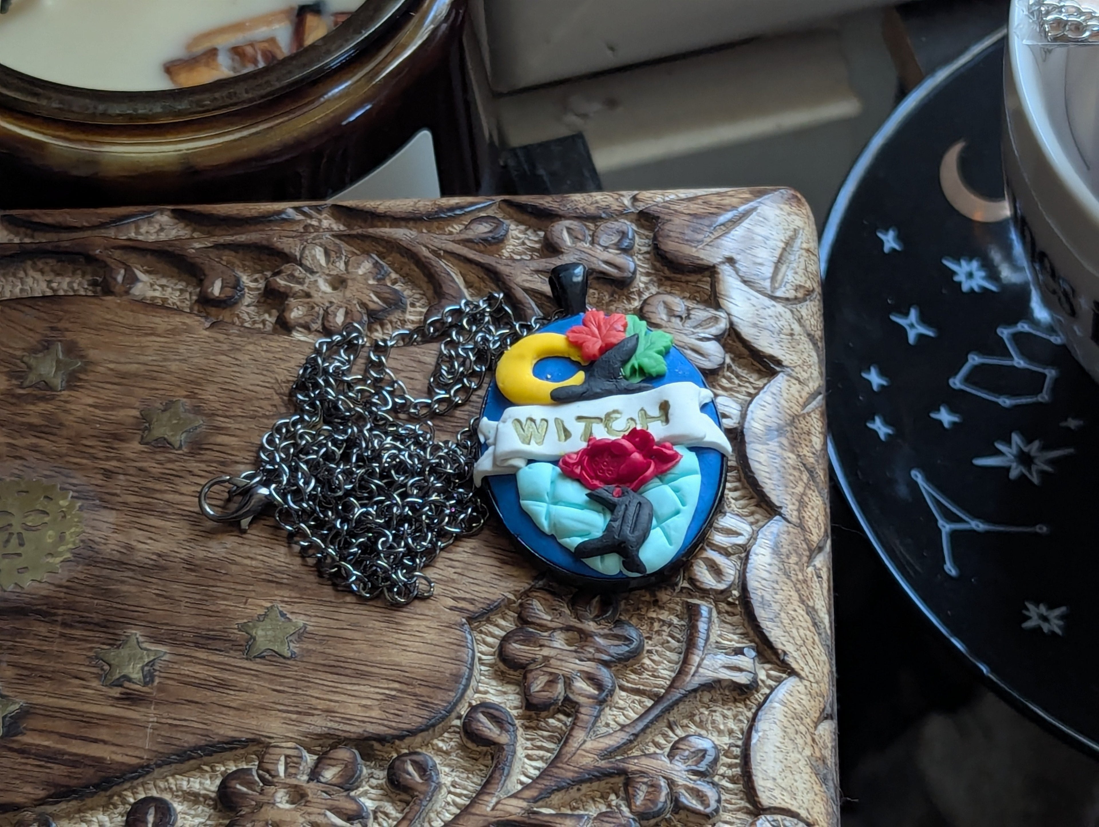 Witchy and fantasy-inspired hand-sculpted clay jewelry for magical self-expression