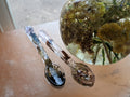 Handcrafted spell spoon trio made with resin, herbs, stone chips, and flower petals