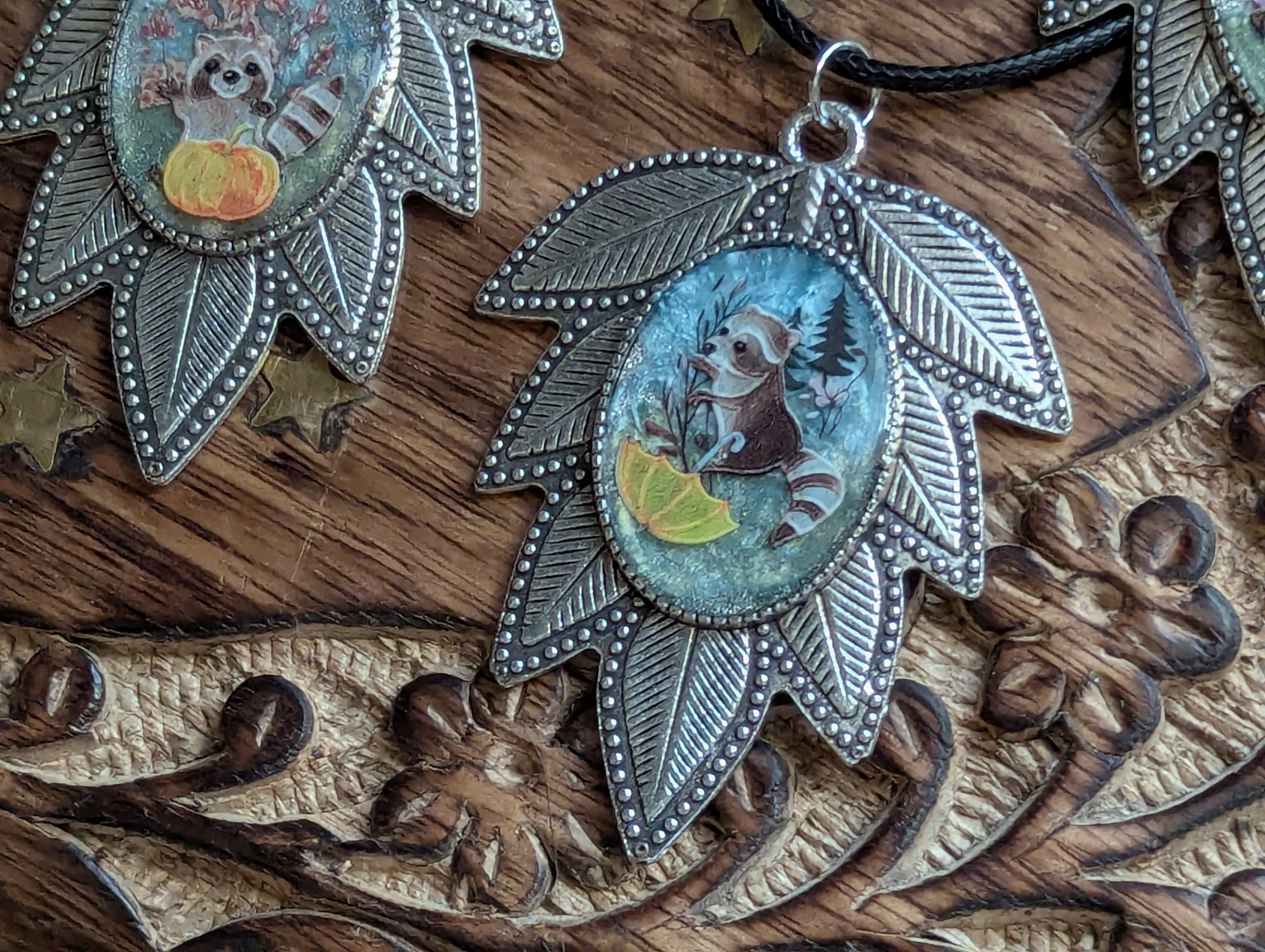 Cottagecore raccoon jewelry with resin and garden details