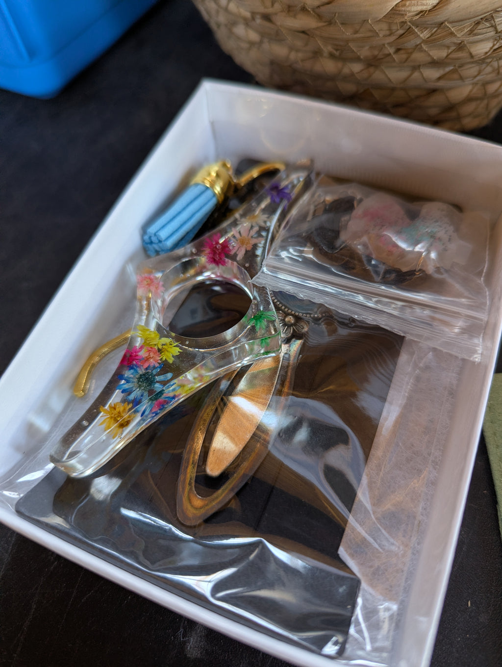 “Bookworm mystery box with bookmarks, jewelry, and literary-inspired gifts”